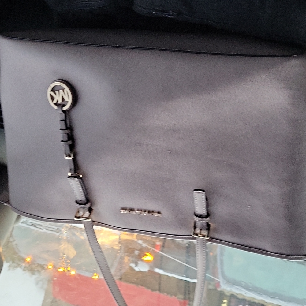 A Michael Kors pink  large multi pocket purse
